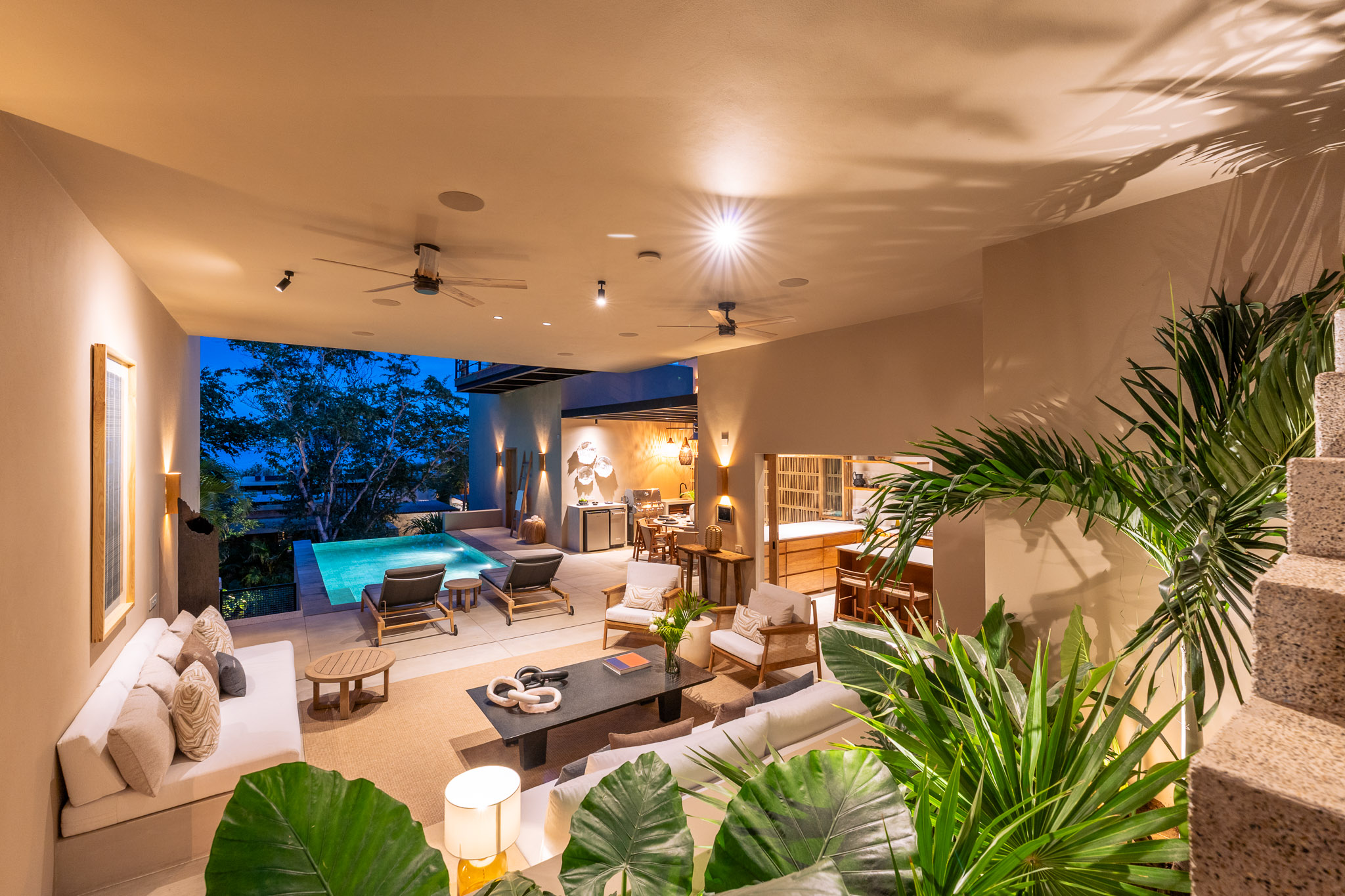 Open-air living room and pool deck